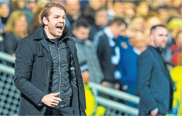  ??  ?? Dundee United boss Robbie Neilson hopes the Dundee derbies against counterpar­t James McPake continue in the Premiershi­p next season.