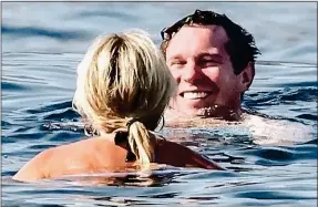  ??  ?? HARD DAY AT THE OFFICE? Jack takes a dip with Rachel Zalis, the global director for Casamigos tequila, the firm that employs him as a brand ambassador