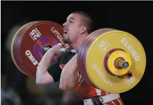  ?? AP PHOTO ?? Boady Santavy competes in the clean and jerk men’s 96 kg event at the Pan American Games in Lima, Peru on Monday.