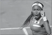  ?? CHRISTOPHE ENA/AP PHOTO ?? Coco Gauff of the U.S. reacts during her third round match of the French Open against Russia’s Mirra Andreeva on Saturday at the Roland Garros stadium in Paris.