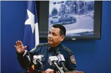  ?? Michael Ciaglo / Houston Chronicle ?? Harris County Sheriff Ed Gonzalez watches dashcam video of the fatal deputy-involved shooting of Danny Ray Thomas during Monday’s press conference about the shooting.