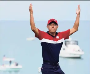  ?? Ashley Landis / Associated Press ?? Team USA’s Collin Morikawa reacts after winning the 17th hole during a Ryder Cup singles match at the Whistling Straits Golf Course on Sunday in Sheboygan, Wis.