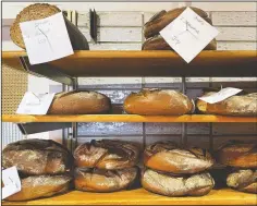  ??  ?? Bread baked with beer is displayed at the Coelven bakery in Duesseldor­f.