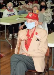  ?? Doug Walker ?? Marine Corps veteran Robert Rakestraw, 97, was one of two World War II veterans at the Veterans Day ceremonies.
Top: U.S. Air Force veteran Jerry Kichler sounded taps.