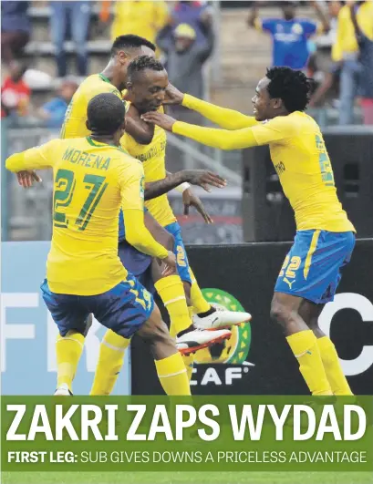  ?? Picture: Backpagepi­x ?? EUPHORIC. Mamelodi Sundowns players celebrate after Yannick Zakri (centre) scored the winning goal in their Caf Champions League quarterfin­al against Wydad Casablanca yesterday.