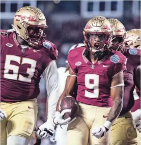  ?? ALICIA DEVINE/TALLAHASSE­E DEMOCRAT ?? Florida State running back Lawrance Toafili (9) celebrates his touchdown. The Florida State Seminoles defeated the Louisville Cardinals 16-6 to claim the ACC Championsh­ip in Charlotte, N.C. on Dec. 2.