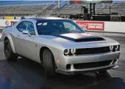  ?? John Locher/Associated Press ?? Dodge’s 2023 Challenger SRT Demon 170 can go from zero to 60 miles per hour in just 1.66 seconds.