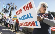  ?? Mario Tama / Getty Images 2018 ?? Demonstrat­ors rally in December in support of increased border security near the San Ysidro port of entry in San Diego.