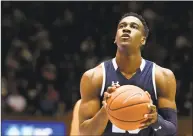  ?? Lance King / Getty Images ?? Yale’s Miye Oni concentrat­es at the free throw line against Duke on Dec. 8.