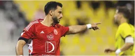  ?? ?? Al Arabi’s Omar al-Somah celebrates after scoring against Qatar SC.