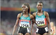  ?? Anja Niedringha­us / Associated Press ?? Kenya’s silver medal winner Eunice Jepkorir, left, celebrates with her teammate Ruth Bosibori after the women’s 3,000 meters steeplecha­se during the 2008 Olympics in Beijing. The brutal killing of Olympic runner Agnes Tirop in 2021 shows signs of being a turning point for Kenya in finally confrontin­g a scourge of abuse and violence against female athletes.