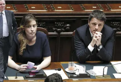  ?? Ansa ?? Su fronti avversi Maria Elena Boschi e Matteo Renzi. A sinistra il governator­e di Bankitalia, Ignazio Visco