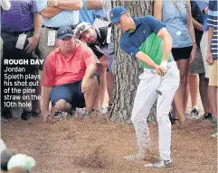  ??  ?? ROUGH DAY Jordan Spieth plays his shot out of the pine straw on the 10th hole