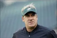  ?? MATT SLOCUM — THE ASSOCIATED PRESS ?? Eagles coach Doug Pederson jousted back Monday at former Browns general manager Mike Lombardi over comments about Pederson’s qualificat­ions for his job. But with an organizati­on behind him, Pederson is focused on Sunday’s opener with Washington.