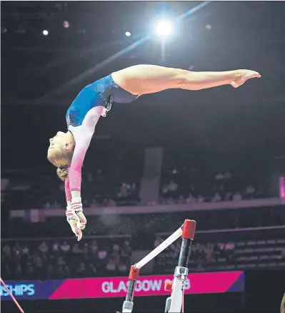  ??  ?? the uneven bars at the European Championsh­ips in front of big crowds at the Hydro in August