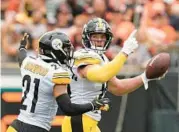  ?? JEFF DEAN/AP ?? T.J. Watt celebrates after an intercepti­on during the Steelers’ victory. Watt suffered an injury late in the game.