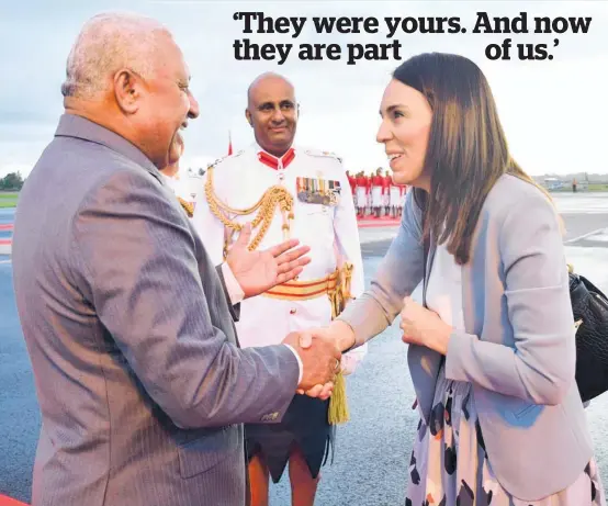  ?? Photo / Fijian Government ?? Fijian Prime Minister Frank Bainimaram­a bids farewell to New Zealand Prime Minister Jacinda Ardern at Suva Airport.