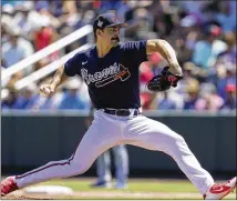  ?? STEVE HELBER/AP ?? Braves starting pitcher Spencer Strider delivers in the third inning of Monday’s spring training win over the Blue Jays at Cooltoday Park in North Port, Florida. Strider hit 100 mph multiple times, potentiall­y strengthen­ing his case for a rotation spot.