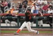  ?? ASHLEY LANDIS — THE ASSOCIATED PRESS ?? The Giants' Michael Conforto hits a home run during the first inning of a spring training game against the Milwaukee Brewers in Scottsdale, Ariz., on Thursday.