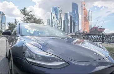  ?? REUTERS ?? A Tesla Model 3 electric vehicle is seen in Moscow, Russia, in 2020.