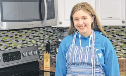  ?? CHRISTIAN ROACH/CAPE BRETON POST ?? Hannah Lynk stands in the kitchen of the Whitney Pier Boys and Girls Club on Tuesday. The 11-year-old Sydney resident was one of the winners of the Kid Food Nation’s national recipe contest.