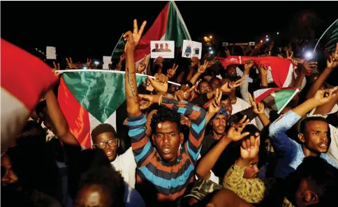  ??  ?? File photo shows Sudanese demonstrat­ors protesting outside the Defence Ministry in Khartoum, Sudan. — Reuters photo