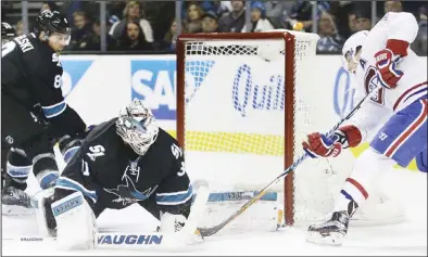  ?? (AP) ?? Montreal Canadiens’ Brendan Gallagher (right), takes a shot against San Jose Sharks goalie Martin Jones (31) during the second period
of an NHL hockey game, Dec 2, in San Jose, California.