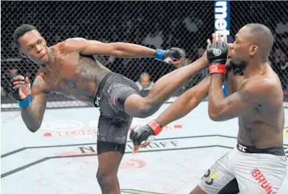  ?? Photo / Getty Images ?? Israel Adesanya beat Derek Brunson with a first-round knockout to win his fourth fight in 2018.