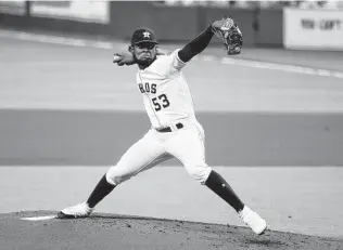  ?? Karen Warren / Staff photograph­er ?? Astros starter Cristian Javier exceeded expectatio­ns as a rookie in 2020, going 5-2 with a 3.48 ERA. But he never has thrown more than 1132⁄3 innings in a profession­al season.