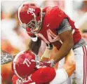  ?? THE ASSOCIATED PRESS ?? Alabama running back Damien Harris, top, celebrates with teammate Matt Womack after Harris scored a touchdown Saturday against Tennessee in Tuscaloosa, Ala.