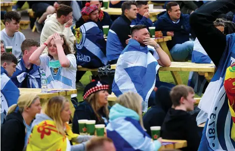  ?? Pictures: REUTERS; GETTY; PA; REX ?? Agony…Scotland fans were left holding their heads after their side’s 2-0 defeat to the Czechs