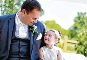  ?? CONTRIBUTE­D ?? Kayla Unbehaun is seen with her dad, Ryan Iskerka, at his wedding in June 2014. Kayla was allegedly abducted by her mother, Heather Unbehaun, from South Elgin, Illinois, in July 2017, a few months after her father was awarded full custody.