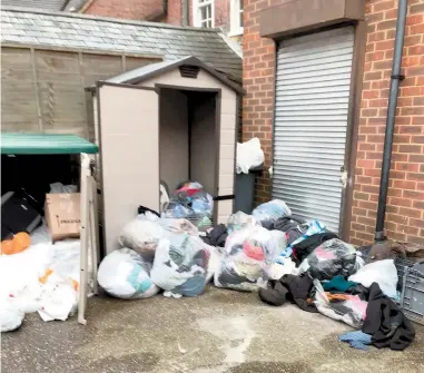  ?? ?? The ransacked storage units at the RSPCA shop in Burnham.