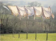  ??  ?? Fluttering and dancing: shirts left out to dry in Ystradfell­te, south Wales