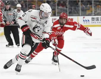  ?? BOSTON HERALD FILE ?? GOOD WEEKEND: Northeaste­rn’s Ryan Shea had two goals and an assist Saturday as the Huskies defeated Colgate, 4-3, to win the Friendship Four in Belfast.