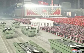  ?? AFP photo — ?? Photo shows a military parade celebratin­g the 8th Congress of the Workers’ Party of Korea (WPK) in Pyongyang.
