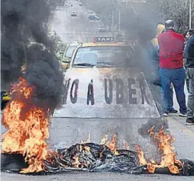  ?? (R. PEREYRA) ?? Uber. Generó protestas de remiseros y de taxistas en Córdoba.