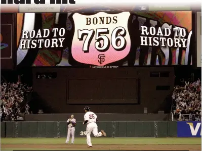  ?? Paul Kitagaki Jr. /The Sacramento Bee /TNS ?? San Francisco Giants’ Barry Bonds rounds the bases after hitting his 756th home run against the Washington Nationals to break Hank Aaron’s record at AT&T Park on Aug. 7, 2007, in San Francisco, California.