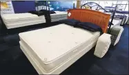  ?? Associated Press ?? A selection of mattresses is available for sale at a bedding store in Cranberry Township, Pa. Demand for durable goods edged up a slight 0.8 percent in September, a sharp slowdown from a 4.6 percent jump in August, the Commerce Department reported Thursday.