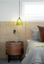  ?? ?? A wall-to-wall headboard forms the basis of the bedroom’s Japanese-inspired look.