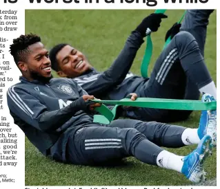  ??  ?? Stretching a point: Fred (left) and Marcus Rashford yesterday REUTERS