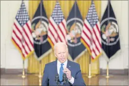  ?? EVAN VUCCI — THE ASSOCIATED PRESS ?? President Joe Biden delivers remarks on the economy from the East Room of the White House in Washington on Thursday.