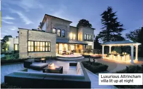  ??  ?? Luxurious Altrincham villa lit up at night