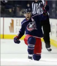  ?? JAY LAPRETE — THE ASSOCIATED PRESS ?? The Blue Jackets’ Cam Atkinson celebrates his goal against the Tampa Bay Lightning during the third period of Game 3 of a first-round playoff series April 14 in Columbus. The Blue Jackets beat the Lightning, 3-1.