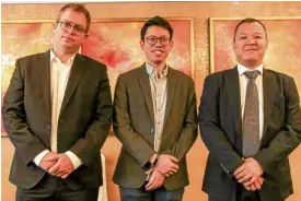  ??  ?? PARTNERS FOROFWS. (From left) Madanes Group CEOOhad Madanes, PhilCare CEO Jaeger Tanco, and Jardine Lloyd Thompson Insurance and Reinsuranc­e Brokers CEO Raul Tan