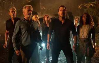  ?? John Wilson/Universal Pictures ?? “Jurassic World Dominion” feels like a high school reunion with, from left, Jeff Goldblum as Dr. Ian Malcolm, Sam Neill as Dr. Alan Grant, Laura Dern as Dr. Ellie Sattler, Bryce Dallas Howard as Claire Dearing, Chris Pratt as Owen Grady, Isabella Sermon as Maisie Lockwood and DeWanda Wise as Kayla Watts.