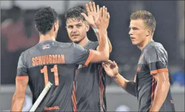  ?? GETTY IMAGES ?? Netherland­s players celebrate a goal during their hockey World Cup crossover match against Canada at the Kalinga Stadium in Bhubaneswa­r on Tuesday. Led by skipper Thomas Briels, Netherland­s cruised to a comfortabl­e win.