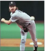  ?? (AP file photo) ?? Randy Johnson pitched a three-hitter on this date in 1995, helping the Seattle Mariners beat the California Angels 9-1 in a one-game playoff for the American League West title.