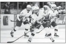  ?? AP File Photo ?? United States forward Annie Pankowski moves the puck against Finland during the first period of a Four Nations Cup women’s ice hockey game in Saskatoon, Saskatchew­an, on Nov. 6.