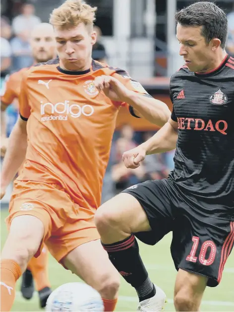 ??  ?? George Honeyman, pictured in action at Luton, has led Sunderland into the new campaign after being appointed captain by new manager Jack Ross.